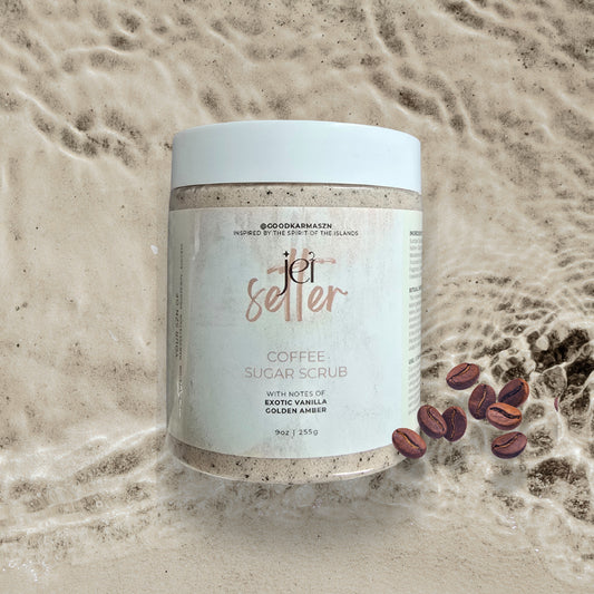 Jar of coffee sugar scrub with coffee beans on a sandy background