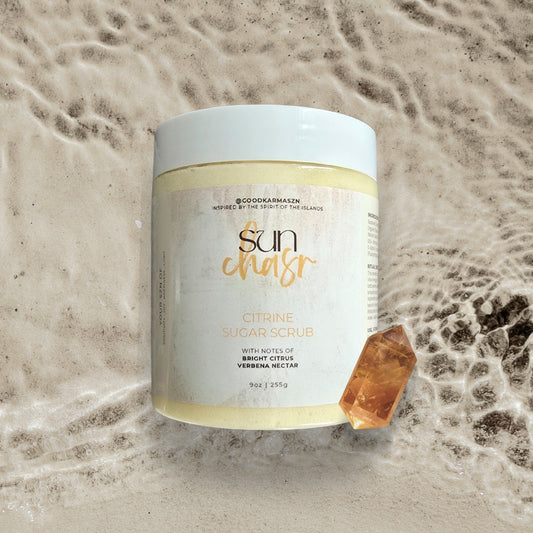 Sun Chaser Citrine Sugar Scrub container on a textured stone background